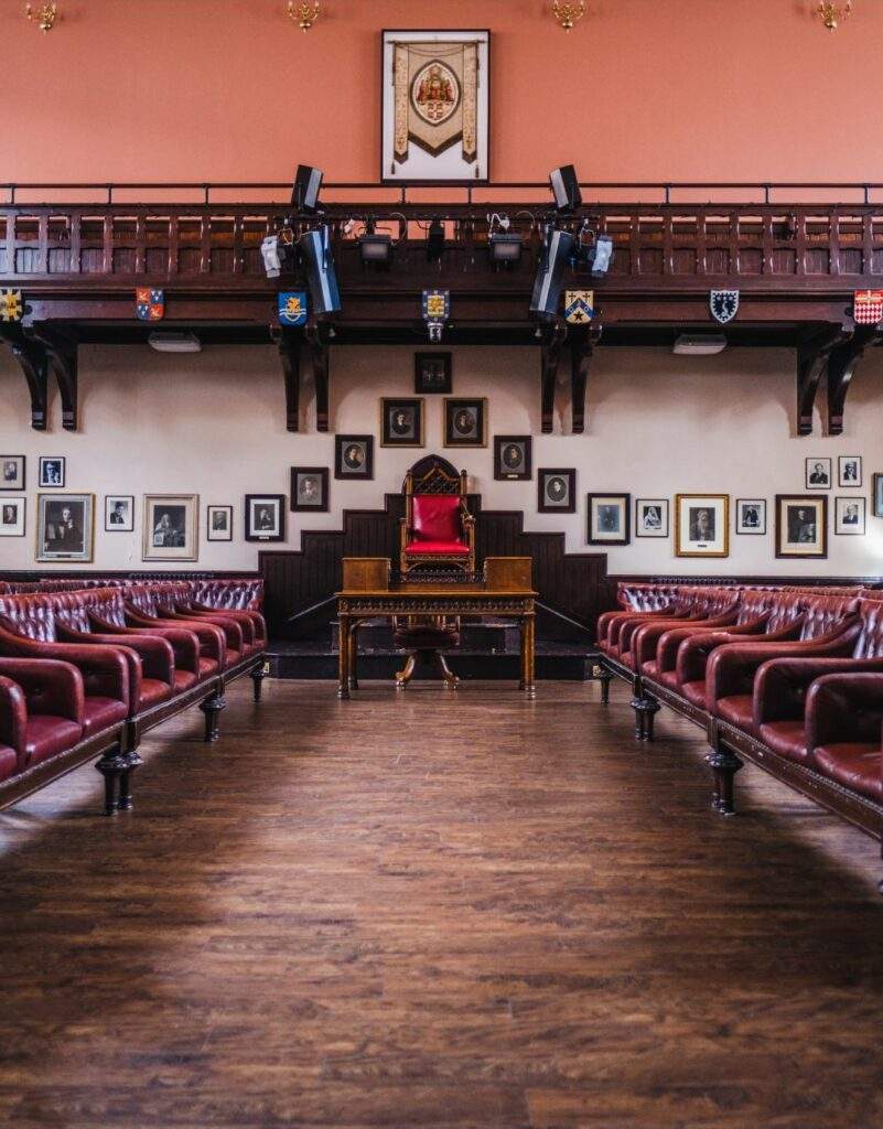 The Cambridge Union Society Debate Chamber benches and altar